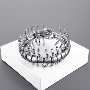 Macro shot of punk style centipede bracelet with antique finish industrial metal texture