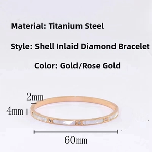 Detailansicht des Titanstahl-Armreifs mit Muschelbesatz, 2 mm Dicke und 60 mm Durchmesser
