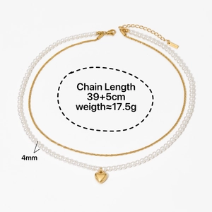 Double-layer stainless steel necklace featuring gold chain, pearls, and heart pendant