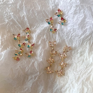 Three pairs of elegant butterfly earrings with colorful cubic zirconia and gold plating