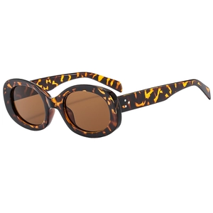 Retro oval tortoiseshell sunglasses with brown lenses and triple stud metal rivets