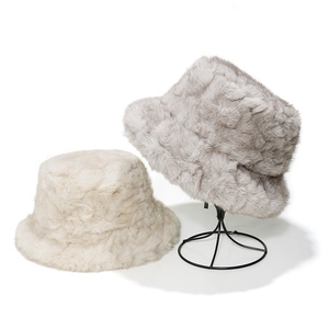 Winter faux fur bucket hat for women with thick plush lining in beige and light grey