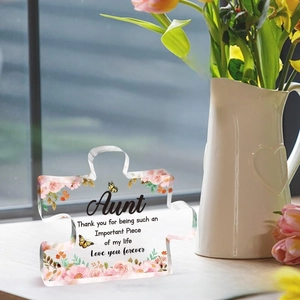 Close-up of heart-shaped acrylic puzzle gift for Aunt with floral patterns and butterflies