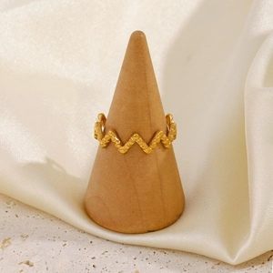Minimalist irregular zigzag open ring in gold stainless steel on a wooden stand