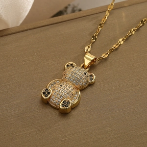Golden bear pendant necklace with sparkling zircon pavé on a classic O-style chain