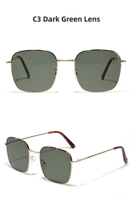 Detail of square gold metal sunglasses with dark green lenses and tortoiseshell temples