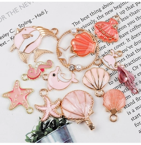 Pink marine life alloy charms set for DIY jewelry with shells, starfish and dolphins