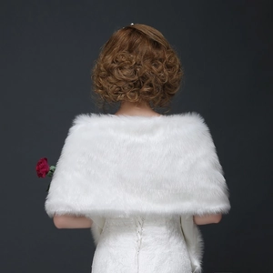 Winter faux fur bridal shawl in white, plush wedding cloak for women shown from back view