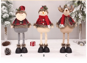 Detail of telescopic Christmas plush toys with red plaid outfits and festive scarves