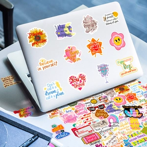 Waterproof motivational stickers shown on a laptop surface with sunflowers and quotes