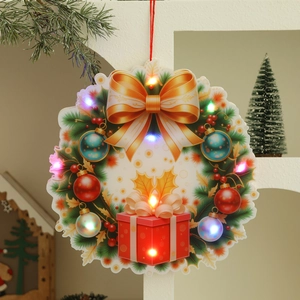 Close-up of lighted PVC Christmas hanging ornament with festive gift box and ribbon