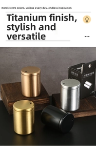 Macro shot of brushed stainless steel toothpick holders in gold, silver, and bronze colors