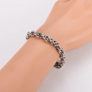 Minimalist 7.5mm silver twisted rope chain bracelet displayed on a model wrist