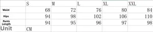 Size chart for high waisted ripped jeans with elastic waist including waist and hip measurements