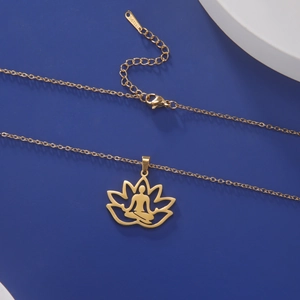 Detailed shot of golden stainless steel lotus yoga necklace with meditation pendant