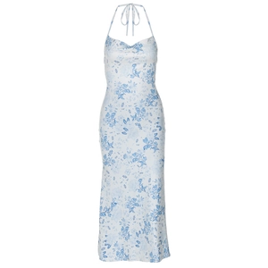 Detailed flat lay of a white floral maxi dress with blue prints and a side slit
