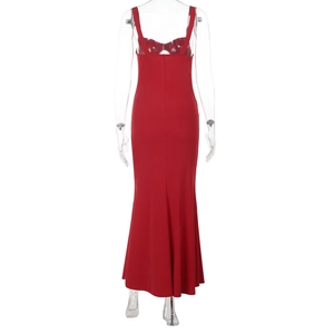 Detail view of red bodycon maxi dress with backless design and mermaid hemline