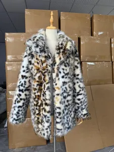Detail of leopard print faux fur coat with beige, brown, and black animal patterns