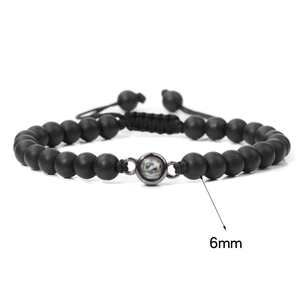 Adjustable 6mm black matte stone beaded bracelet with hidden language projection stone