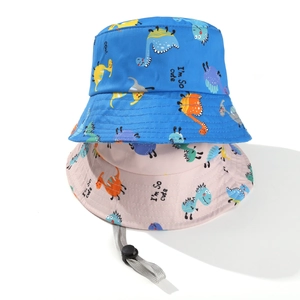 Detail showing cartoon dinosaur print on cotton sun hats with adjustable windproof cords