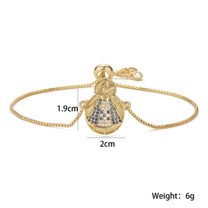 Detailed view of 18K gold plated Mary pendant with blue and white zircon stones