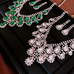 Luxury water drop jewelry sets with green and white gemstones in silver plating