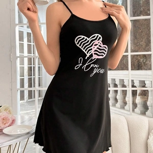 Women's black slip sleepwear dress with heart print and I Love You slogan detail