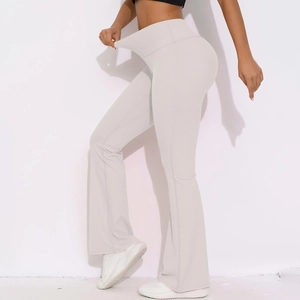 Close-up of high-waist yoga flared pants showing excellent fabric elasticity and texture