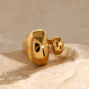 Minimalist gold abstract double ball open ring on stone base for artistic women