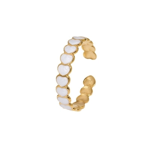 Minimalist gold plated heart ring with white enamel accents on a clean white background