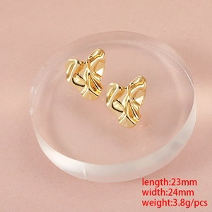 Irregular pleated gold stainless steel earrings on stand with 23mm size dimensions