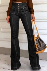 Detail of high waisted flare jeans with four-button fly and front square pockets