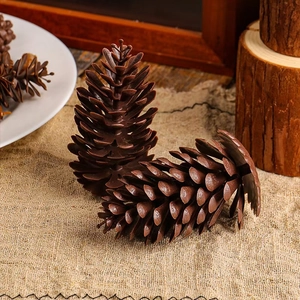 Rustic artificial pine cones on burlap for DIY crafts and holiday home decoration