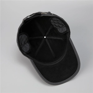 Detail of warm winter baseball cap with quilted windproof fabric and black fleece lining