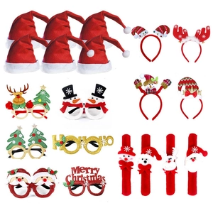 Flat lay of 20pcs Christmas party accessory set with hats, glasses and headbands