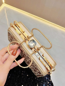 Luxury champagne gold evening clutch bag with rhinestones and heart-shaped metal handles