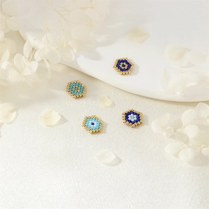 Handmade evil eye hex beads for necklaces and bracelets with blue and gold seed beads