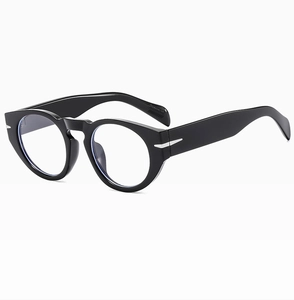 Close-up of retro black round frame sunglasses with thick edges and silver temple details