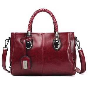 Retro burgundy oil wax leather Boston bag with woven handles and long shoulder strap