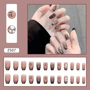 Sparkly black ballet press-on nails with silver glitter and rhinestone details