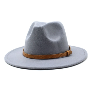 Detail of grey fedora hat featuring a brown snakeskin leather band with metal buckle