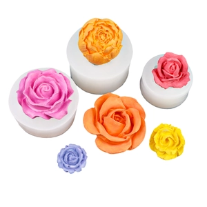 Various sizes of rose flower silicone molds with colorful 3D fondant floral decorations