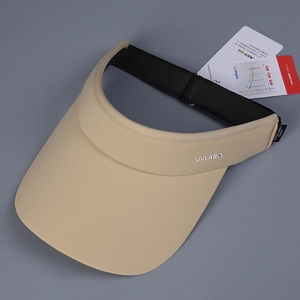 Detail of beige visor hat with UVLABCL logo, elastic band and functional cool knit tags