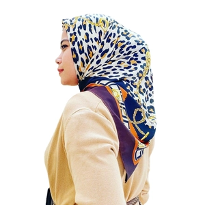 90cm leopard and chain print satin silk headscarf for women on a studio white background