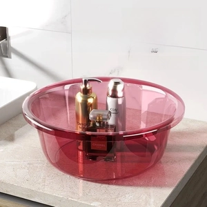 Close-up of translucent red PET plastic basin showing smooth rounded edges and high clarity