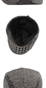 Detail of retro beret cap featuring herringbone and houndstooth patchwork texture