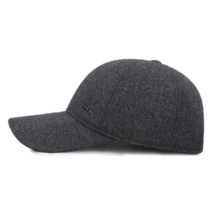 Men's wool blend winter baseball cap in dark grey with warm earmuffs and metal logo detail
