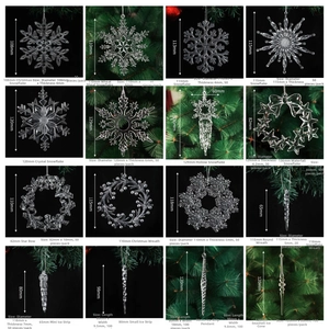 Macro shot of various transparent crystal snowflake and icicle pendants for Christmas tree