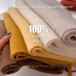 Folded premium white and colorful 100% pure wool scarves with soft fringe details