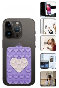 Detail showing heart-shaped silicone suction cup phone holder for smooth surfaces